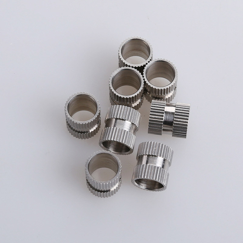 Tuerca de inserción de doble vía