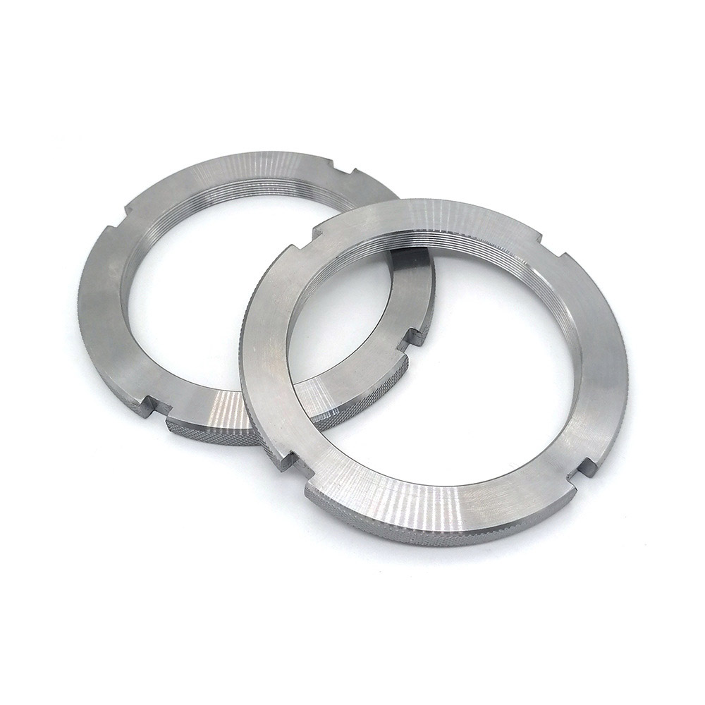 Tuercas redondas ranuradas completamente roscadas