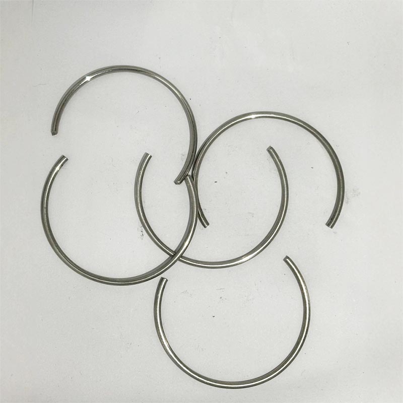 Anillos de retención para orificios de alambre redondo